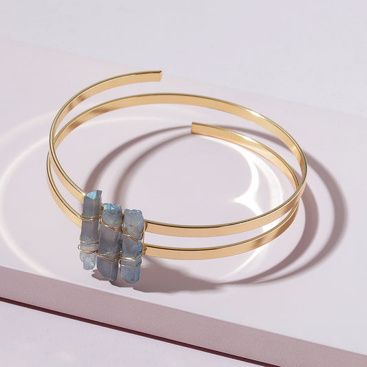 Elegant Gold Cuff Bracelet with Raw Aquamarine Crystals