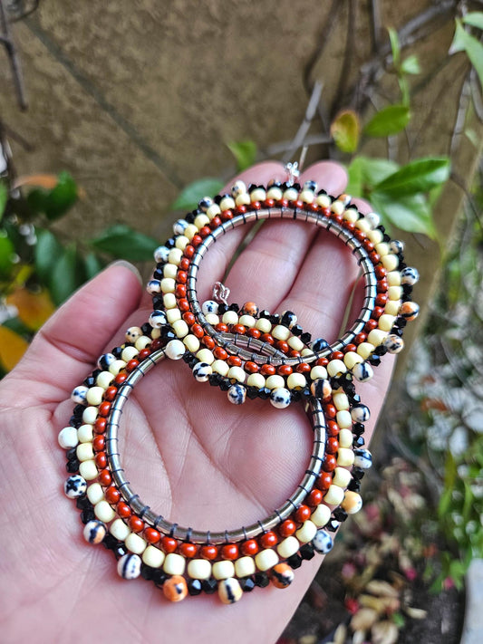 brown beaded statement hoop earrings