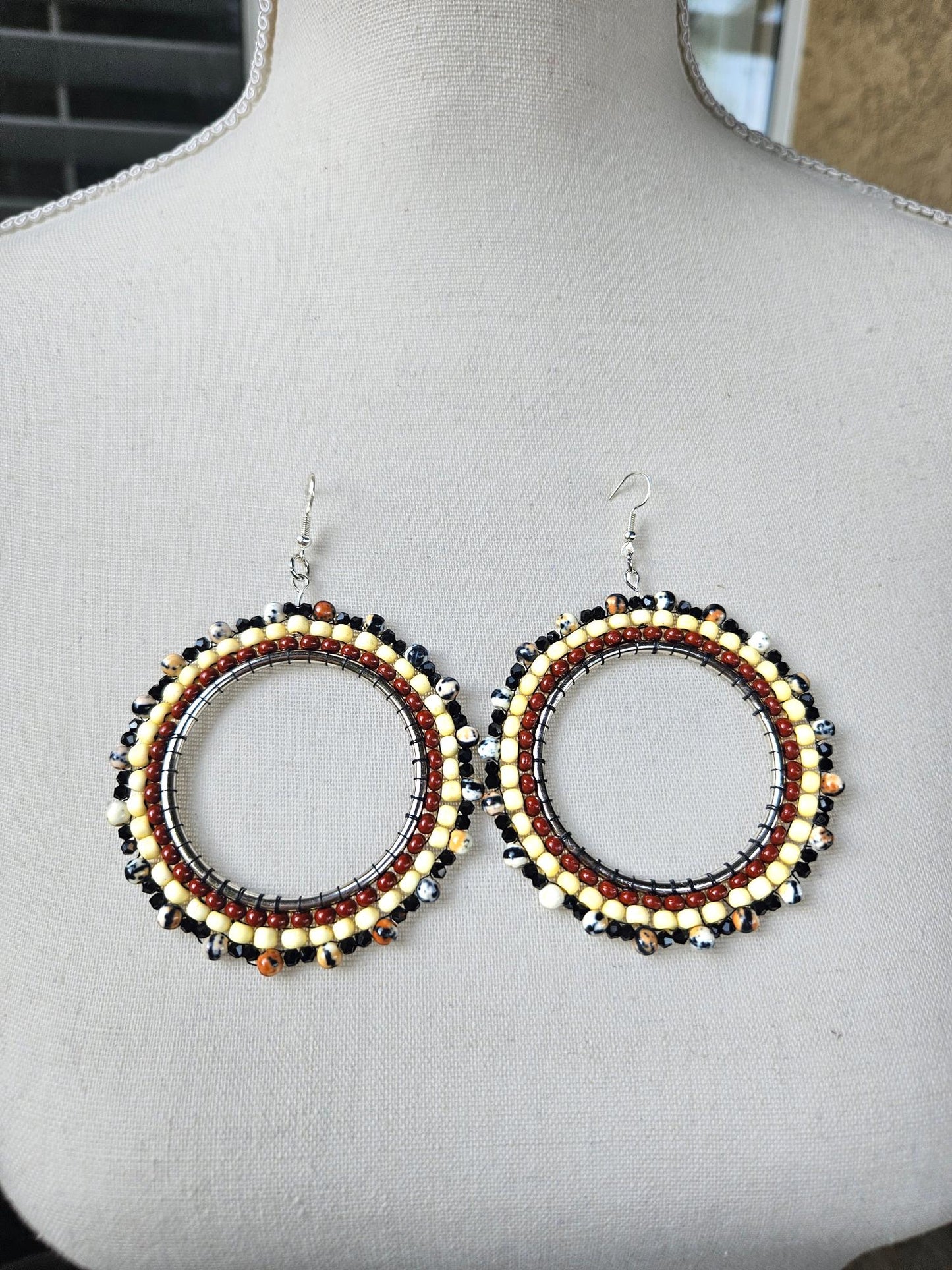 brown beaded statement hoop earrings